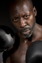 African-American boxer about to throw a punch.