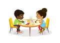 African American Boy and Girl sit at the round table and draw picture with watercolor and pencils. Drawing activity in