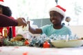 African american boy holding glass of juice Royalty Free Stock Photo