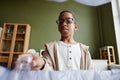 African American Boy Recycling Waste at Home Royalty Free Stock Photo