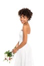 African american bride holding bouquet and looking at camera isolated on white Royalty Free Stock Photo