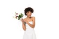 African american bride holding bouquet and looking at camera isolated on white Royalty Free Stock Photo