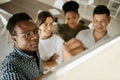 African american business man leader coach with glasses writing on board explaining idea and thoughts while