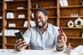 African American business man making orders transaction via the Internet Royalty Free Stock Photo