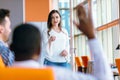 African american Business people Raising there Hand Up at a Conference to answer a question Royalty Free Stock Photo