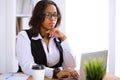 African American business woman is busy with paper job in office Royalty Free Stock Photo