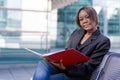 African american business woman with folder Royalty Free Stock Photo