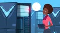 African American Business Woman Working On Digital Tablet In Modern Database Center Or Server Room Businesswoman