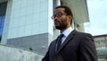 African-American businessman in eyeglasses, treatment blurred vision, eyesight