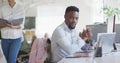 African American businessman at his desk in an office setting Royalty Free Stock Photo