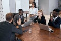 African american businessman holding meeting with young business people Royalty Free Stock Photo