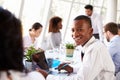 African American Businessman At Meeting With Colleagues Royalty Free Stock Photo