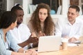 African American businessman mentor teaching interns, using laptop Royalty Free Stock Photo