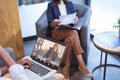 African american businessman during online meeting with multiracial colleagues in office Royalty Free Stock Photo