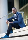 African american businessman sitting in the city Royalty Free Stock Photo