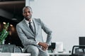 african american businessman sitting on table Royalty Free Stock Photo