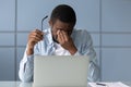 African american businessman taking off glasses, suffering from dry eyes. Royalty Free Stock Photo