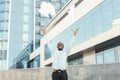 African-american businessman throwing documents in the air Royalty Free Stock Photo