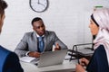 African american businessman with translator near Royalty Free Stock Photo