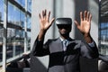 African-American businessman using virtual reality headset in office Royalty Free Stock Photo