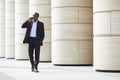 African-American Businessman walking in City Royalty Free Stock Photo