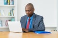 African american businessman working with concentration at computer Royalty Free Stock Photo