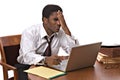 African-American businessman working on laptop