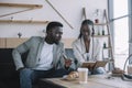 african american businesspeople discussing work during business meeting