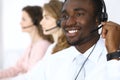 African american call operator in headset. Call center business or customer service concept Royalty Free Stock Photo