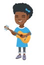 African girl singing and playing acoustic guitar.