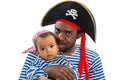 African american child boy and father in costume pirate on white background. Royalty Free Stock Photo