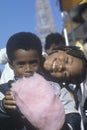 African-American children eating cotton candy