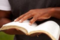 Close up of a man reading the Bible. Royalty Free Stock Photo