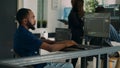 African american coder developing app interface with html code and script Royalty Free Stock Photo