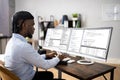 African American Coder Using Computer At Desk Royalty Free Stock Photo
