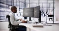 African American Coder Using Computer At Desk Royalty Free Stock Photo