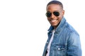 African american commercial model, smiling in stylish casual outfit, wearing sunglasses and jeans, isolated on white background