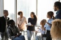 African American confident businesswoman leading briefing in office, training staff Royalty Free Stock Photo