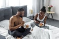 african american couple eating yummy pancakes