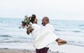 African American couple getting married at the beach Royalty Free Stock Photo