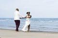 African American couple getting married at an island