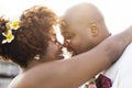 African American couple getting married at an island