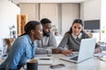 African American couple listening to their financial planner at home