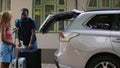 African american couple loading voyage luggage in car Royalty Free Stock Photo