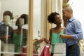 African American Couple Look Shop Window In Panama City