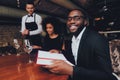 African American Couple Making Order in Restaurant Royalty Free Stock Photo