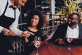 African American Couple Making Order in Restaurant Royalty Free Stock Photo