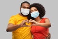 African american couple in medical masks