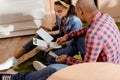 african american couple with money and calculator planning budget in new