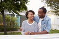 African American couple outside their new house Royalty Free Stock Photo